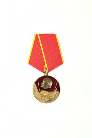 Soviet military medal "80 years of the Komsomol" on a white background.の写真素材