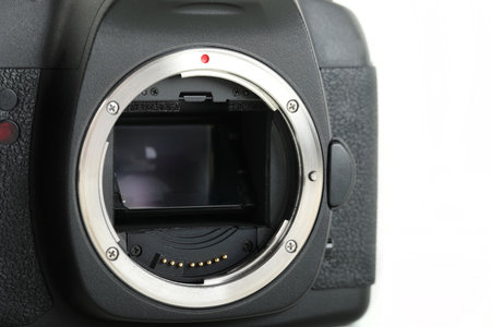 Big Black DSLR Digital Camera full frame sensor on white background.の写真素材