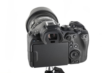 Big Black and Modern digital mirrorless Camera full frame sensor with lens on white background.