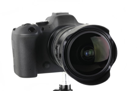Black and Modern digital mirrorless Camera full frame sensor with lens on white background.の写真素材