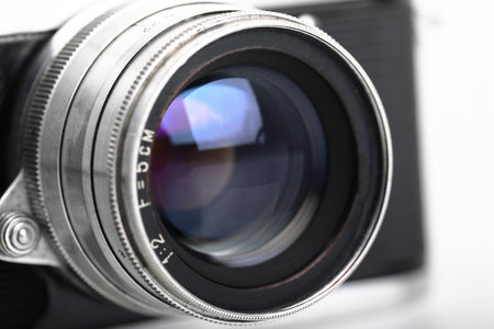 The rare old rangefinder film camera with lens on white background.の写真素材