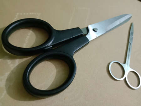 silver and black colored scissors closeupの写真素材