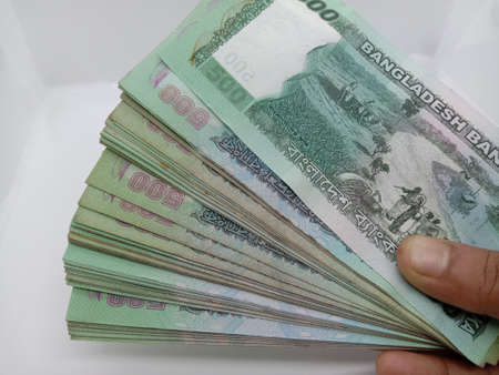 Bangladeshi 500 hundred bank note bundle on white backgroundの写真素材