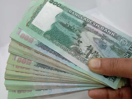 Bangladeshi 500 hundred bank note bundle on white backgroundの写真素材