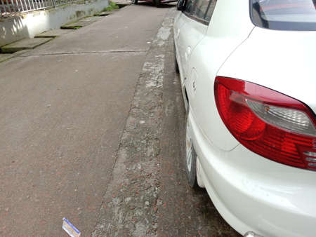 backlight of white colored carの写真素材