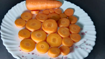 Fresh and delicious and healthy carrots on the plateの写真素材