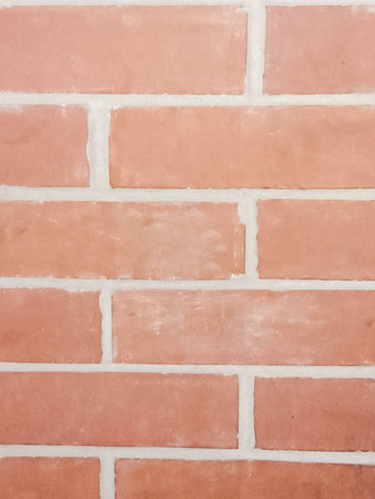 red colored bricks wall closeup in house