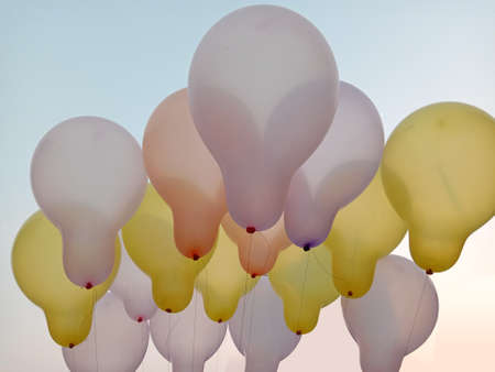 Colorful Balloon stock with gas on the sky for birthdayの写真素材