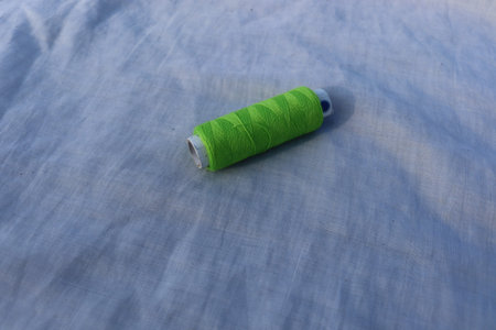 green colored yarn stock on shop for sell