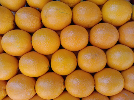 green and yellow colored orange stock on shop for sell