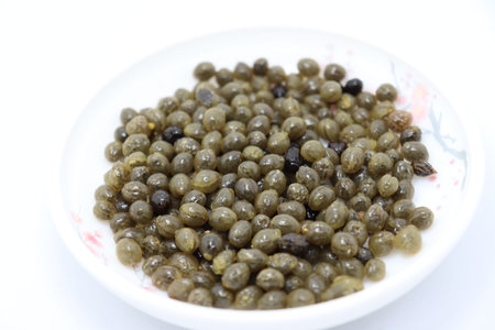 papaya seeds closeup on white bowl for farming