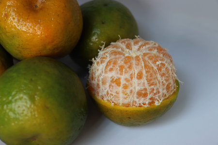 green and yellow colored orange stock on shop for sell