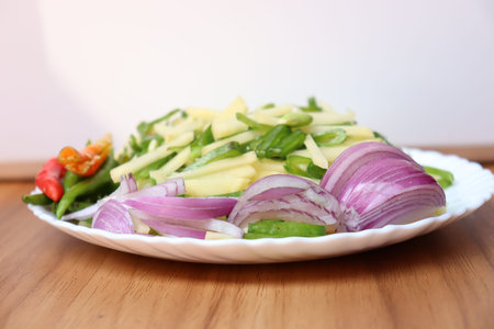 mixed raw vegetable item on plate for cooking