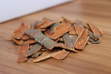 healthy and spicy cinnamon stock on wooden background