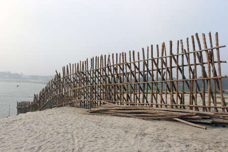 bamboo fence and wall for safety of beach sandの写真素材