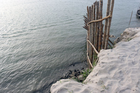 bamboo fence and wall for safety of beach sandの写真素材