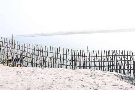 bamboo fence and wall for safety of beach sandの写真素材