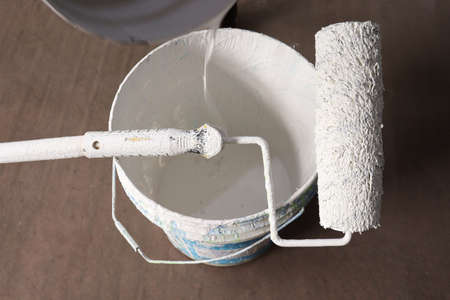 paint brush with paint on pot for sealing paintingの写真素材