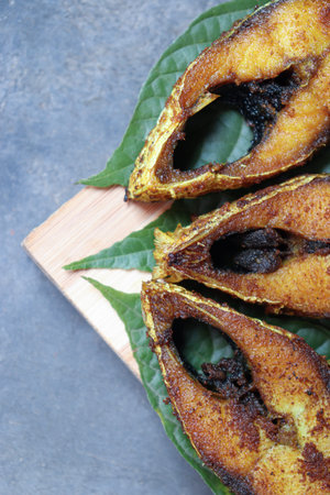 tasty and fried Hilsa fish on kitchen for eat