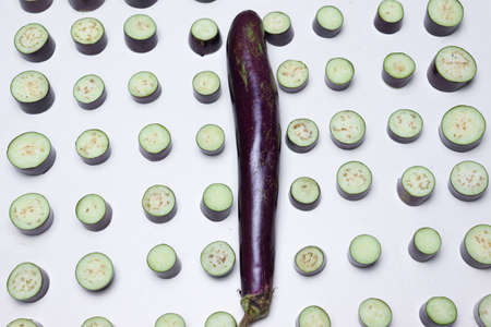 sliced brinjal stock on white background for cookingの写真素材