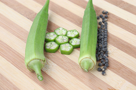 okra stock with leaf and seed on farm for harvestの写真素材