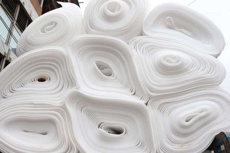 white colored rolled foam stock on shop for sellの写真素材