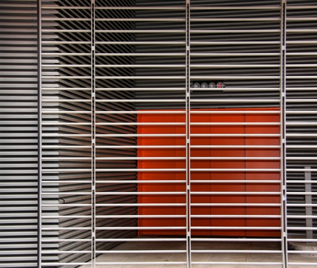 Orange Room behind metal Slatsの写真素材