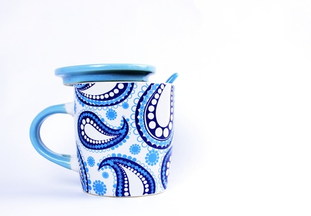 White and Blue Paisley pattern Ceramic Tea or Coffee mug with ceramic Spoonの写真素材