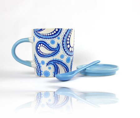 White and Blue Paisley pattern Ceramic Tea or Coffee mug with ceramic Spoonの写真素材