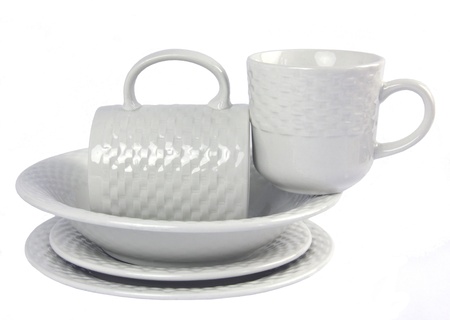 A Stack of White on White Crockery with plates and cupsの写真素材