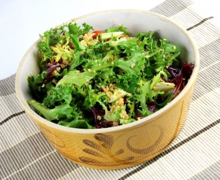 A Yellow Bowl of Healthy leafy Saladの写真素材