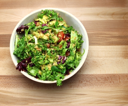 A Yellow Bowl of Healthy leafy Saladの写真素材