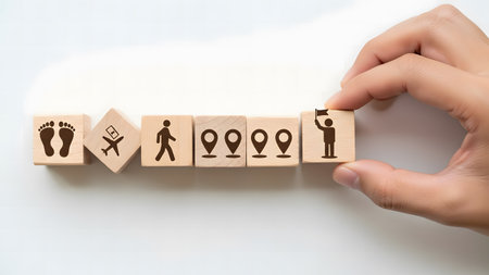 Conceptual image of human resources management with icons on wooden cubesの素材