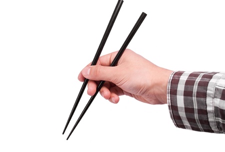 Hand with chopsticks isolated on white backgroundの写真素材