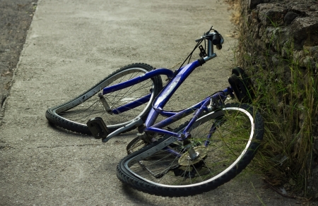 deformation of bicycle after accident on the street の写真素材