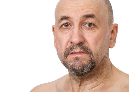 Portrait of Serious Middle aged tatar man on white backgroundの写真素材