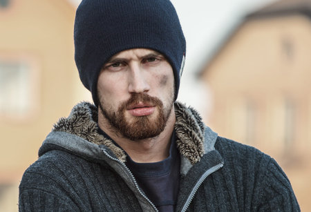 Portrait of serious young worker