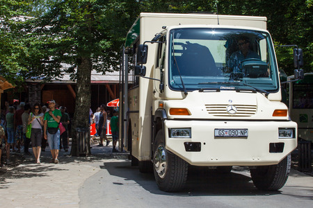 PLITVICE, CROATIA - JULY 23, 2016: Tourists waiting the free shuttle bus for travel around Plitvice Lakes National Parkのeditorial素材