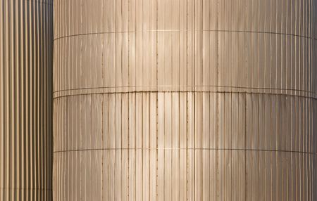 Walls of industrial storage buildings shining in the evening sunの写真素材