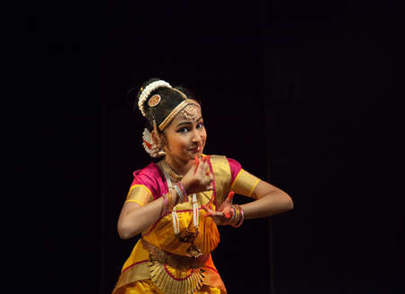 Classical Indian dancers dane on stage on July 10,2019 in Bengaluru,Indiaのeditorial素材