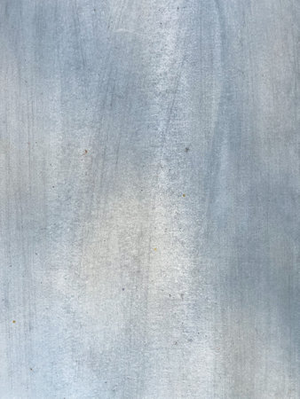 Metal texture with scratches and cracks which can be used as a backgroundの写真素材