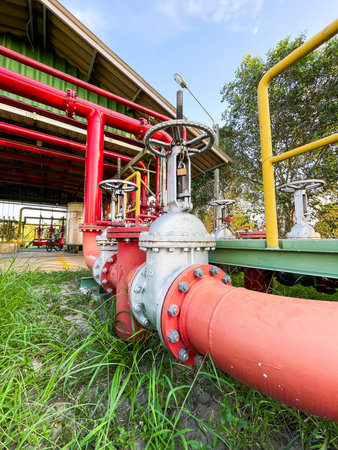 Pipes and valves of oil refinery. Equipment for primary oil refining.の写真素材