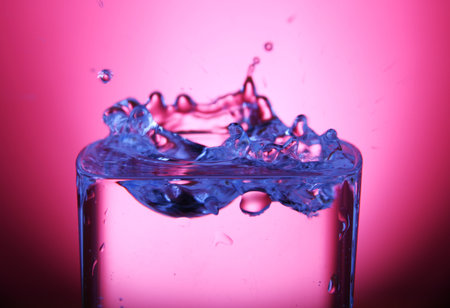 splashing in a glass of water