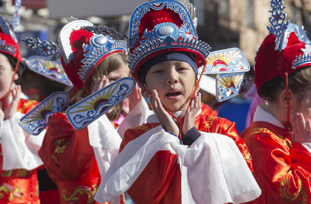 MADRID, SPAIN - FEBRUARY 18th 2018: Chinese New Year parade in the Usera neighborhood, 18-February-2018, Children threeのeditorial素材