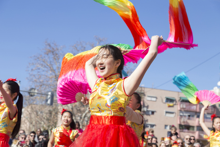 MADRID, SPAIN - FEBRUARY 18th 2018: Chinese New Year parade in the Usera neighborhood, 18-February-2018, girl screaming fansのeditorial素材