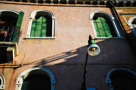 Light and shadow on a Venetian buildingの写真素材