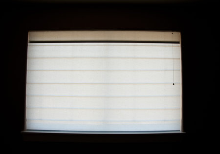 Window with closed shadeの写真素材