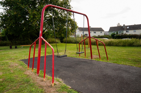 Swings on a playgroundの写真素材