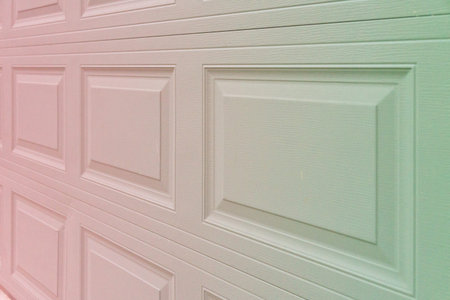 Trendy red to greenish holographic gradient garage door paneling. Colorful background with linear...