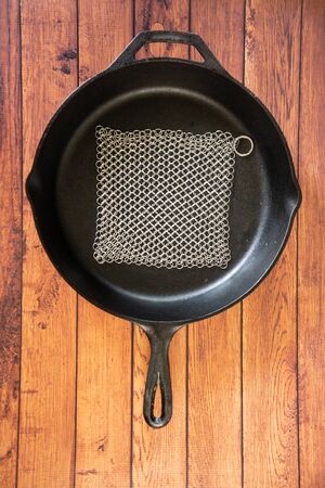 Small Ring Chainmail Scrubber - for Cast Iron, Stainless Steel, Hard Anodized Cookware and Other Pots & Pans. For for Cast Iron Cookware, Dutch Ovens, Casseroles, Stainless Steel Cookware, Woks and more.の写真素材